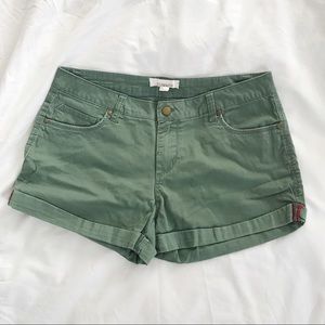 Green cuffed shorts